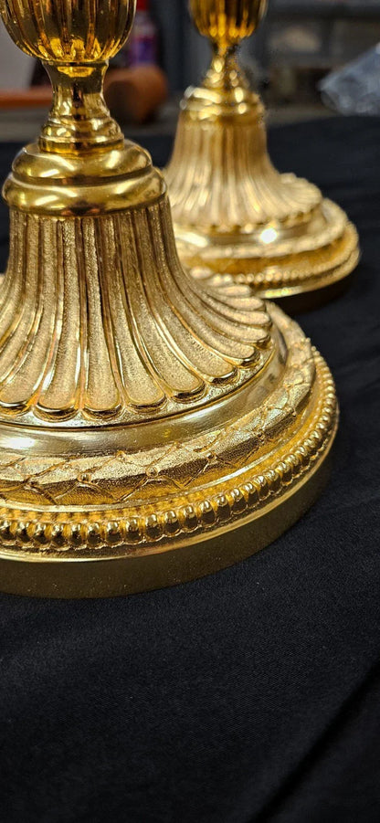Paire de flambeaux en bronze Louis XVI doré
