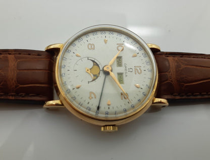 MONTRE OMEGA EN OR 18K DE 1947