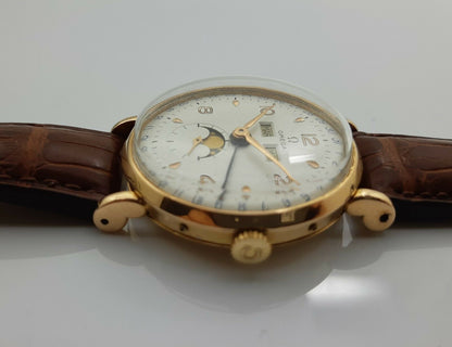 MONTRE OMEGA EN OR 18K DE 1947