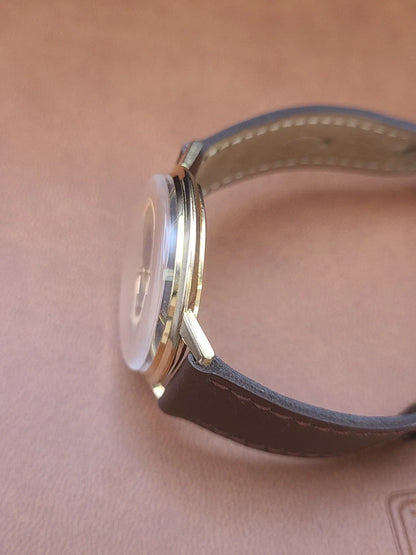 Montre oméga Genève or 18k