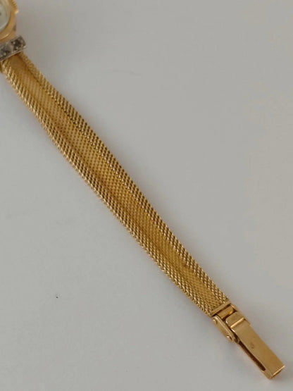 Montre de dame en or 18 carats massif