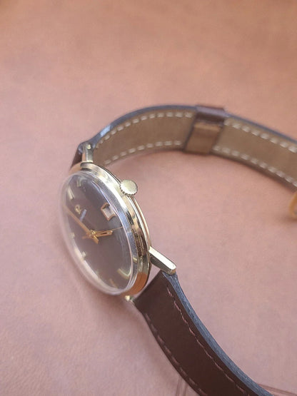 Montre oméga Genève or 18k