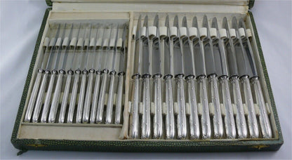 Coffret de 24 couteaux argent fourré modèle Rubans Minerve
