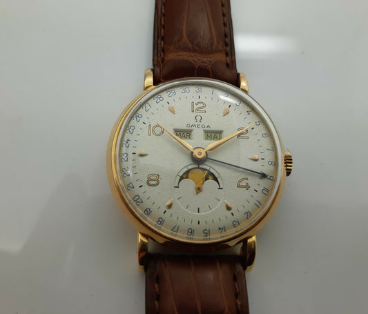 MONTRE OMEGA EN OR 18K DE 1947